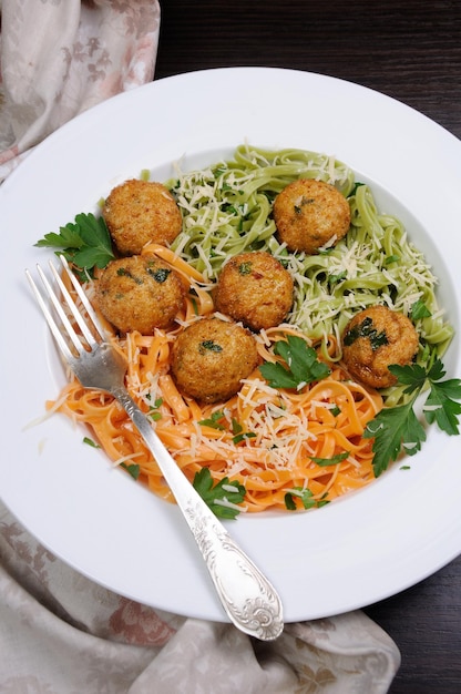 Spaghetti with cheese and meatballs