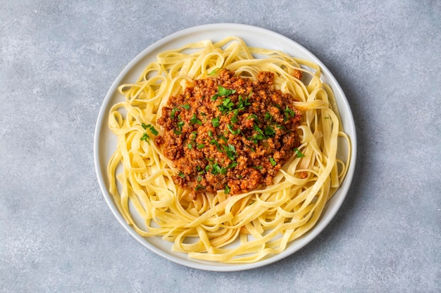 Spaghetti with minced meat in tomato sauce, pasta with noodles. Turkish noodle pasta.