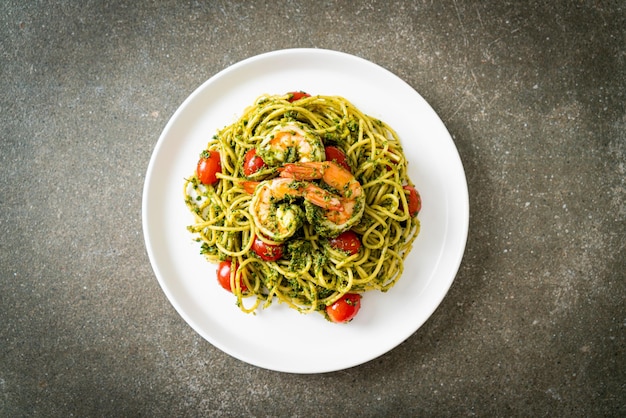Spaghetti with prawns or shrimps in homemade pesto sauce Healthy food style