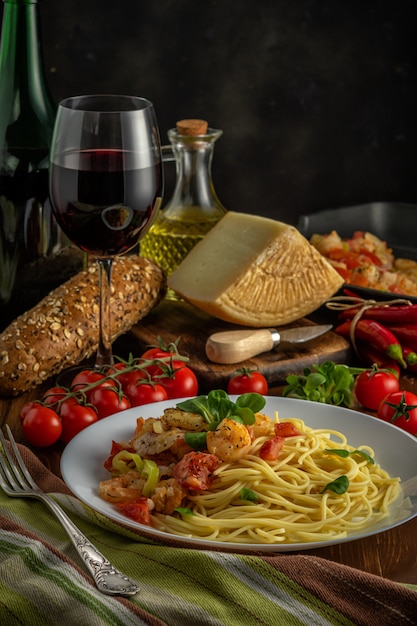 Spaghetti with shrimps, cherry tomatoes and spices