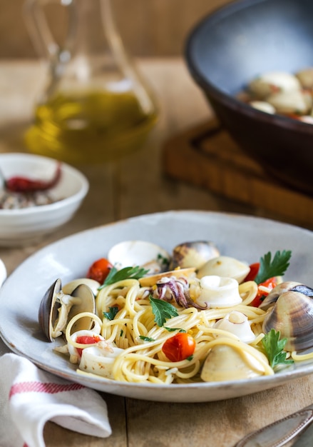 Spaghetti with squid, clam and prawn by sea salt