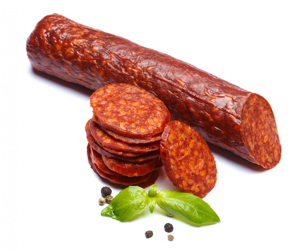 Spanish chorizo sausage on white surface