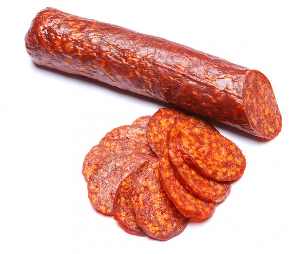 Spanish chorizo sausage on white surface