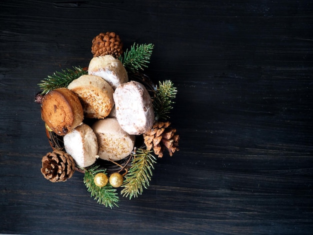 Spanish Christmas sweets Estepa Polvoron Mantecado Nevaditos fir branches and cones