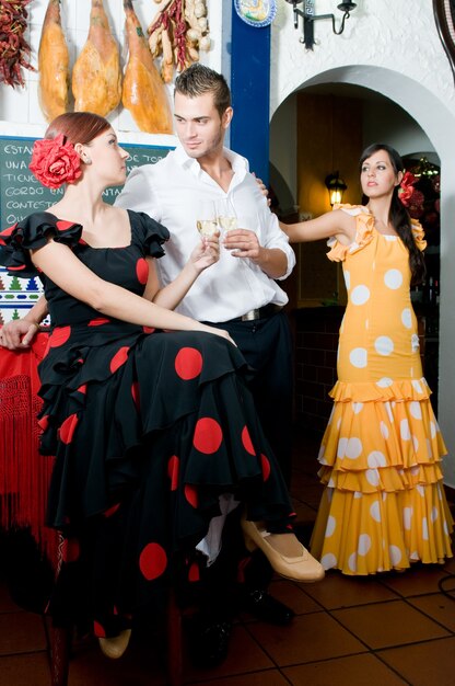 Spanish flamenco dancers during the Seville fair