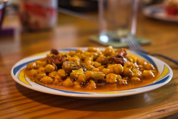 Spanish meal called callos made with chorizo ox tripe ox feet carrots and chick peas