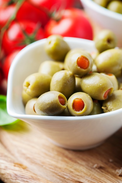 Spanish olives on the wooden table