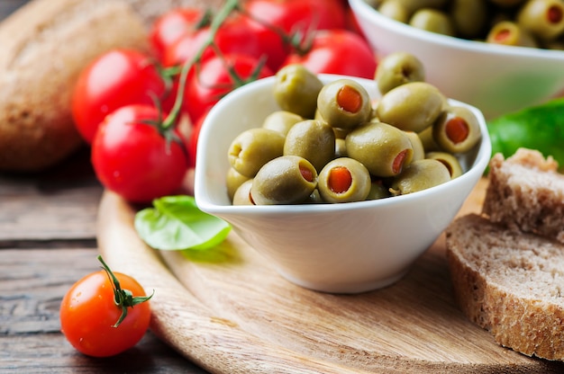 Spanish olives on the wooden table