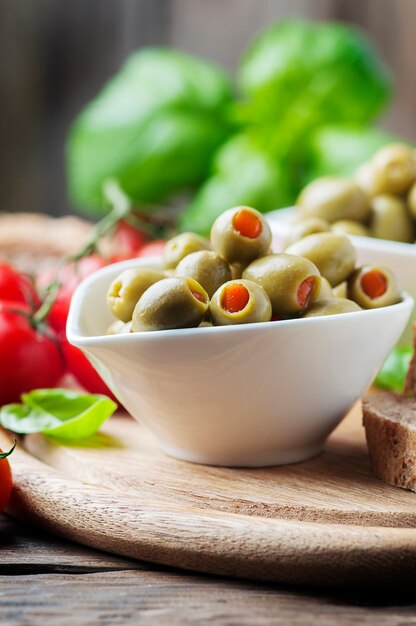 Spanish olives on the wooden table