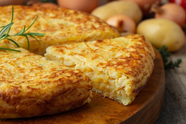 Spanish omelette with potatoes and onion typical spanish cuisine tortilla espanola rustic dark background