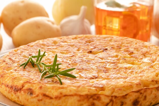 Spanish omelette with potatoes and onion, typical spanish cuisine.