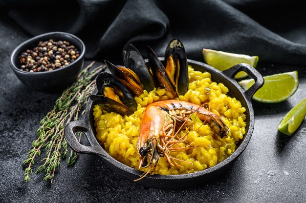 The Spanish paella with seafood prawns, shrimps, mussels