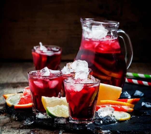 Spanish sangria with fruit and ice selective focus