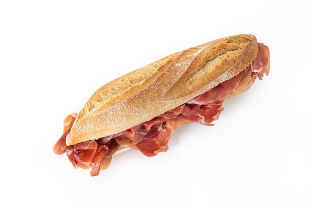 Spanish serrano ham sandwich isolated on white backgroundxA