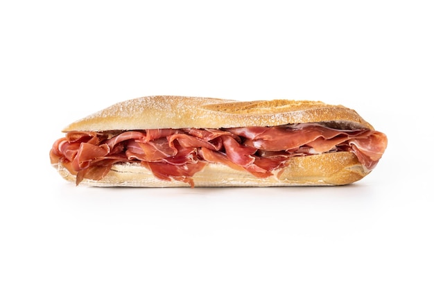 Spanish serrano ham sandwich isolated on white backgroundxA