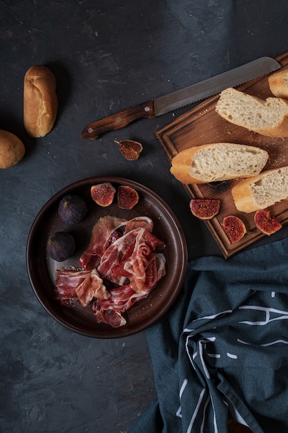 Spanish snacks with ham and figs.