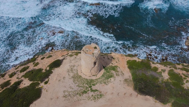 Photo spanish tower in sardinia sa turre sa mora in the putzu idu area