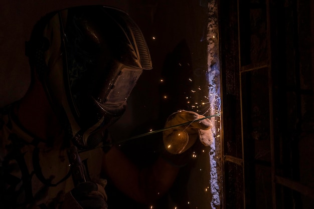 A spark with a small golden flying while welding