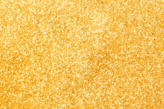 Photo sparkle gold glittering background