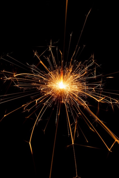 Photo sparkler candle used in celebrations black background selective focus