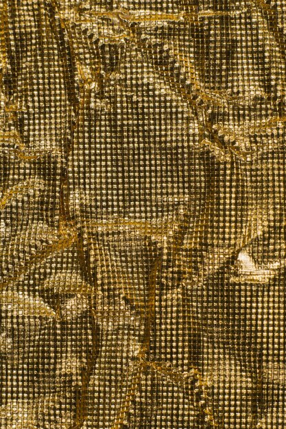 Sparkling gold background texture material metallic foil modern space isolation luxury expensive