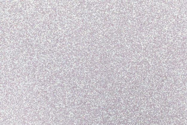 Photo sparkling of white sparkles closeup.