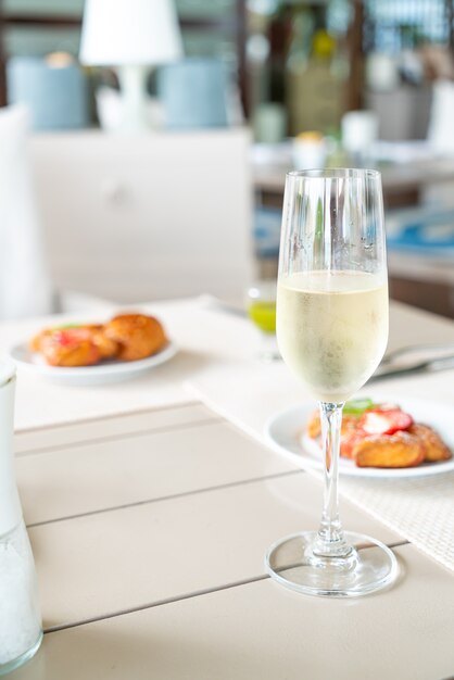 sparkling wine glass on table in cafe restaurant