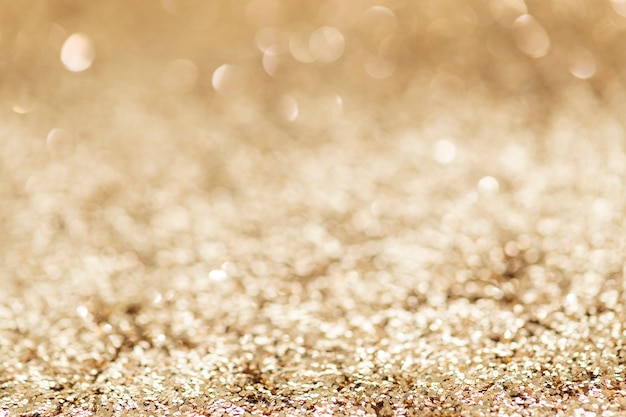 Trama di sfondo glitter oro scintillante