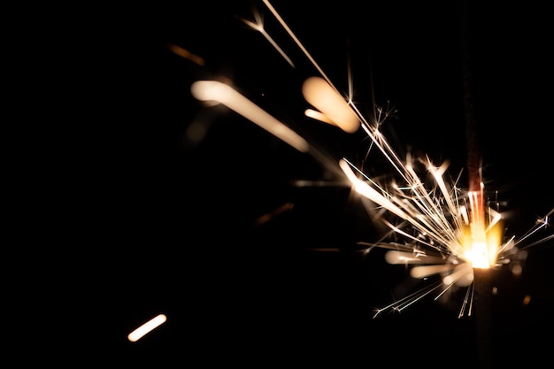 Sparks of Bengal fire on a black background