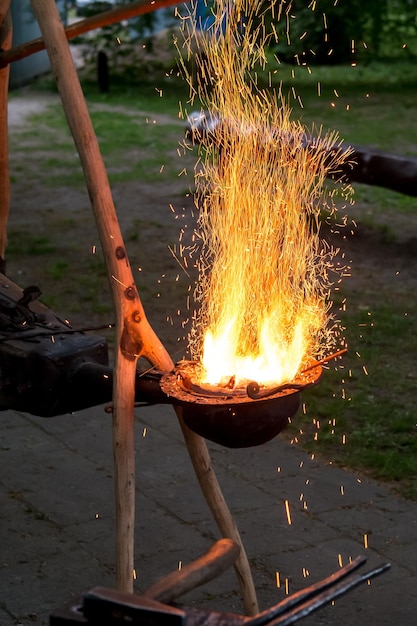 sparks of blacksmith fire in the darkxA