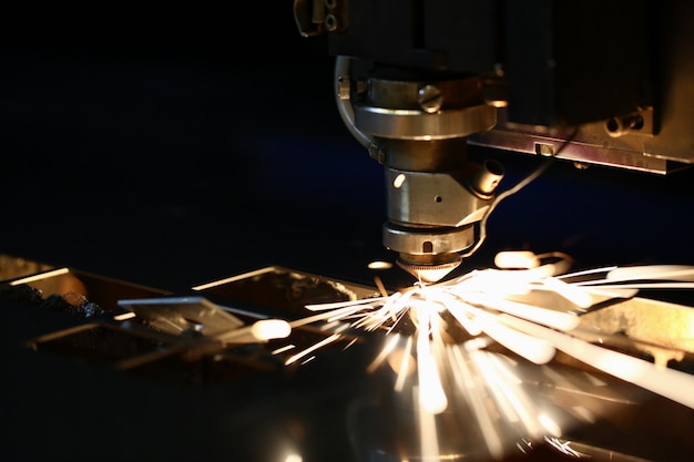 Sparks fly out machine head for metal processing