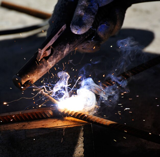 Sparks from welding on a dark background.