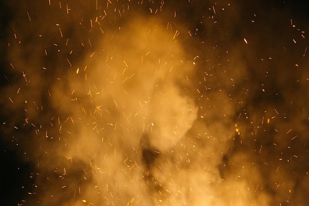 Sparks with smoke at night