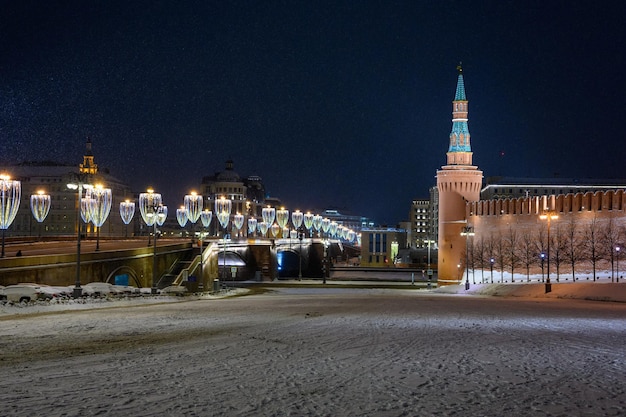 Spasskaya tower and winter Kremlin against the backdrop of street Christmas decorations