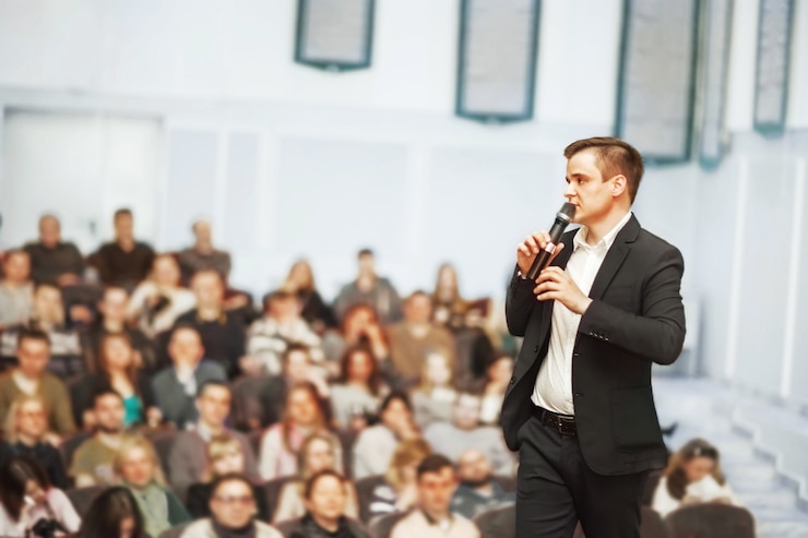 Photo speaker at business convention