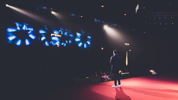 Speaker on stage in a conference room