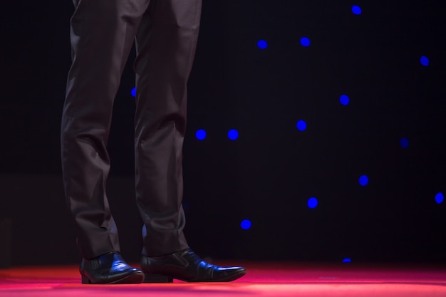 Speaker on stage in a conference room