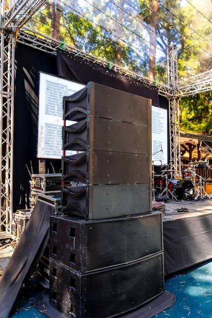 Speakers, sound system for concert. Set of powerful speakers near stage.