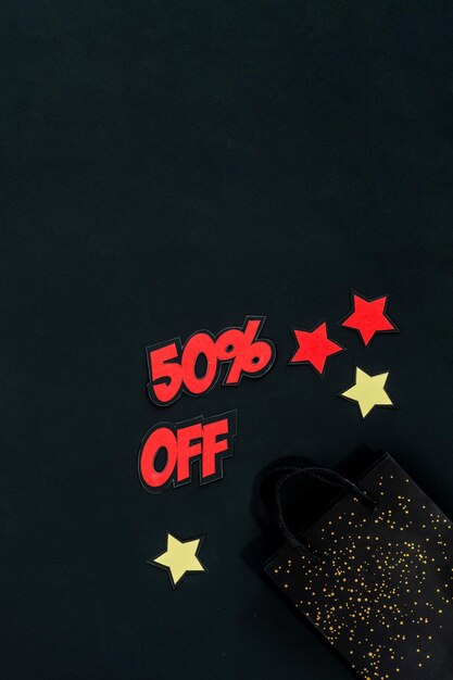 Photo special black friday sale up to 50 off text red and black shopping bag