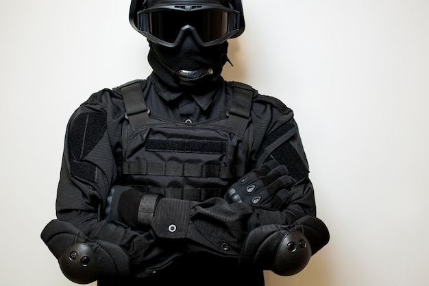 Premium Photo  Special Forces in black uniform mask and body