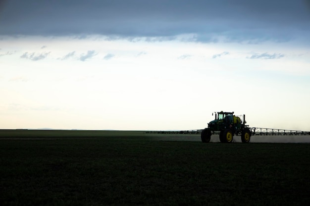 Special tractor for the treatment of fields from weeds and pests.