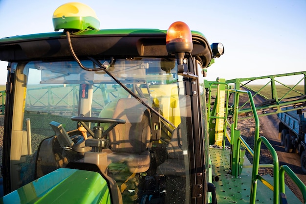 Special tractor for the treatment of fields from weeds and pests.