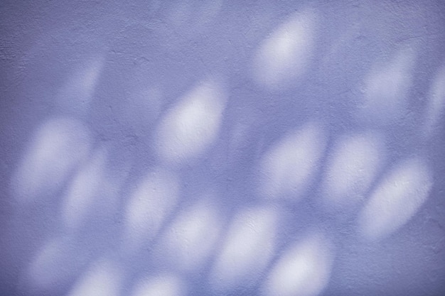 Photo specks of light on blue wall photo