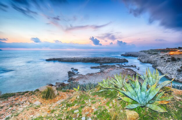 Photo spectacular seascape of isolidda beach near san vito cape popular travel destination of monte cofano national park location san vito lo capo province of trapani sicily italy europe