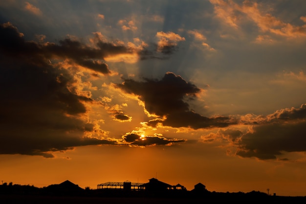 Spectacular sunset over urban area - landscape exterior