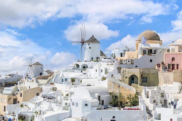 Spectacular views from the sea of Oia, above the cliffs, Santorini, Greece.