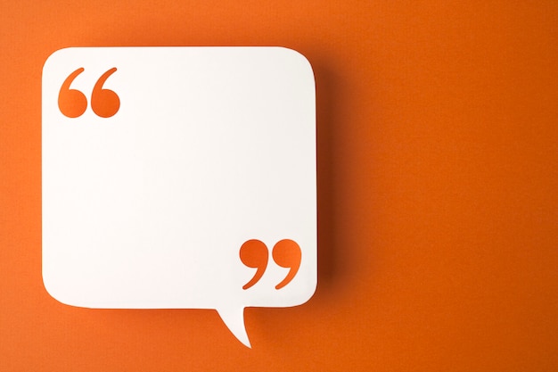 Photo speech bubble on orange surface