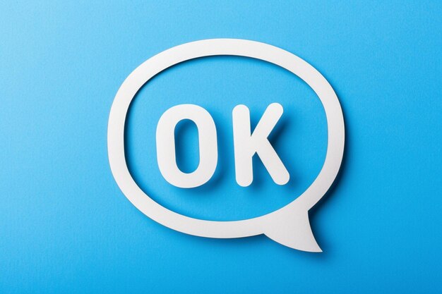 Photo a speech bubble with the word ok inside