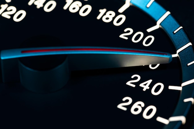 Speed detail with car odometer or tachometer macro shot