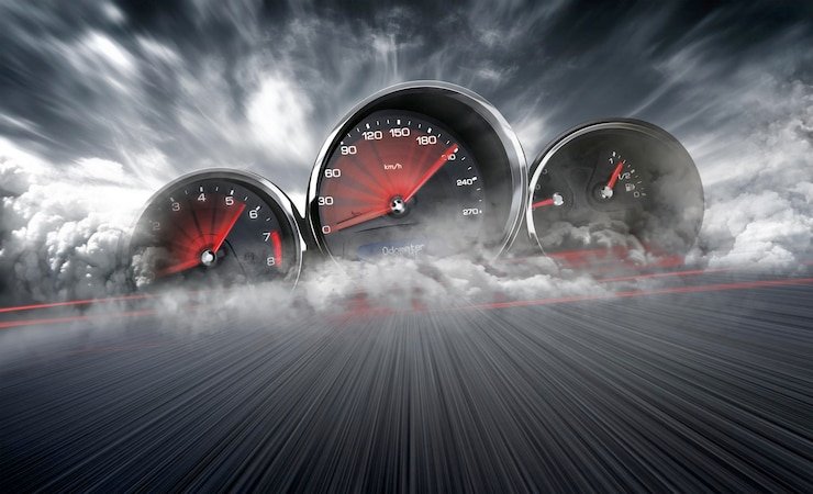 Photo speedometer scoring high speed in a fast motion blur racetrack background speeding car background photo concept
